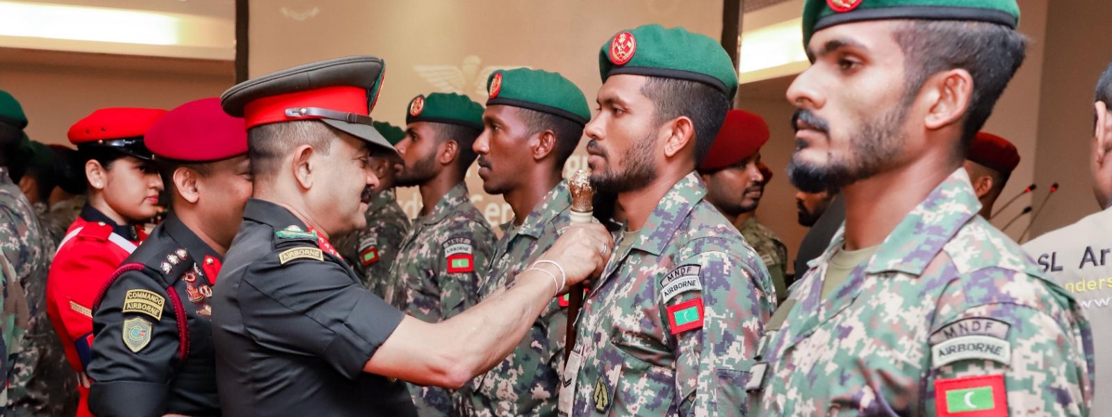 Army Chief Pins Airborne Insignia to Course-mates